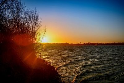 Scenic view of sunset over sea