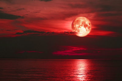Scenic view of sea against sky at night