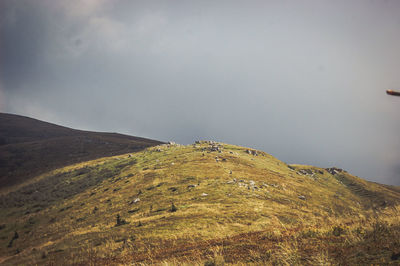 Scenic view of land against sky