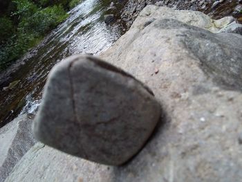 High angle view of stones in water