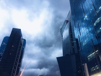 Low angle view of skyscrapers against sky
