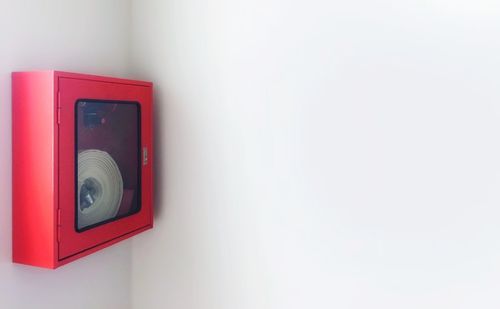 Close-up of camera on wall