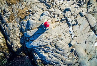 Directly above shot of peggy cove lighthouse on rocky mountain