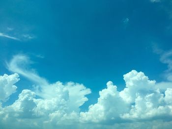 Low angle view of clouds in blue sky