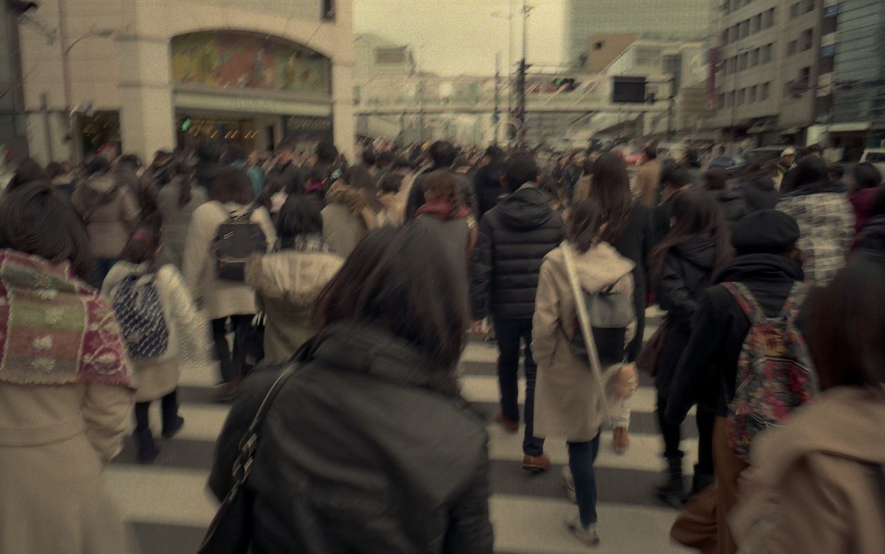 GROUP OF PEOPLE ON THE STREET