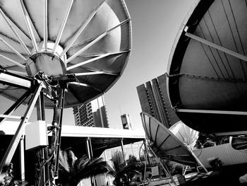 Low angle view of ferris wheel against sky