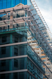 Low angle view of skyscrapers against sky