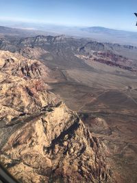 Aerial view of landscape and mountains against sky