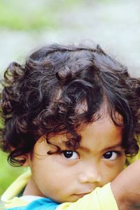 Close-up of boy looking away