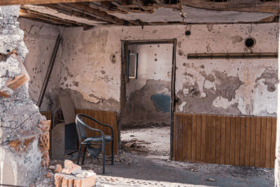 Interior with chair in abandoned house