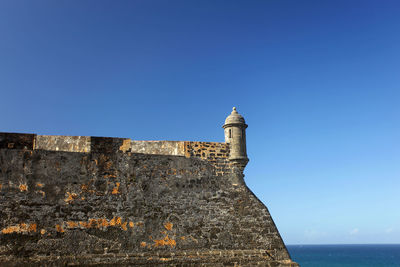 View of fort against blue sky