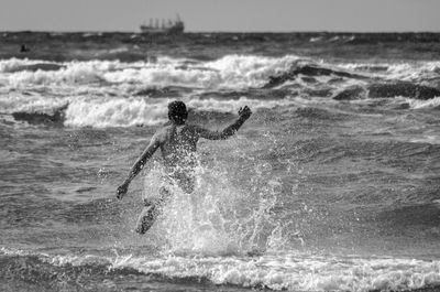 Waves splashing on shore