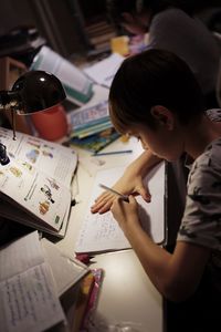 High angle view of woman working at table
