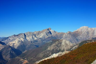Colorful sunset over the mountain peaks on the apuan alps of tuscany in italy