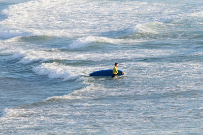 Man surfing in sea