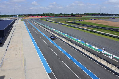 High angle view of airport runway against sky