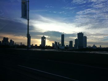 View of cityscape against sky during sunset