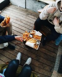 Low section of people eating food