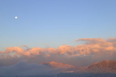 Low angle view of mountain against sky during sunset