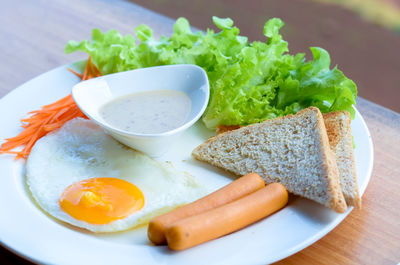 Close-up of breakfast served on table