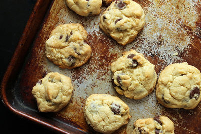 Directly above shot of cookies arranged on rusty tray