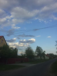 Road against cloudy sky