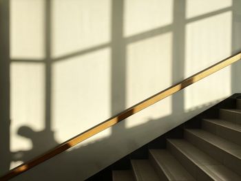 High angle view of staircase against wall