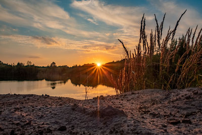 Scenic view of landscape against sky during sunset