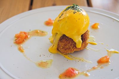 Close-up of crab cake served on table