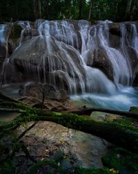 A scenic of waterfall in the jungle