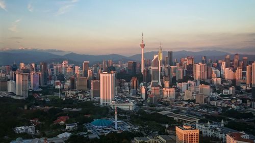 High angle view of cityscape against sky during sunset