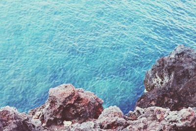 Close-up of rock formation in sea