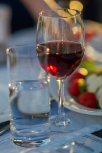 Close-up of wine in glass on table