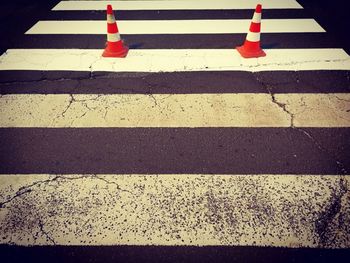 Close-up of zebra crossing on street