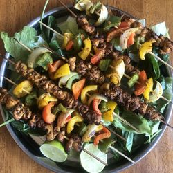 High angle view of chopped vegetables in plate on table