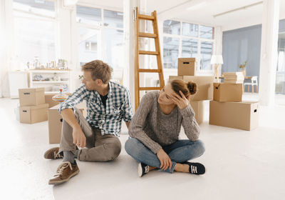 Couple moving into new home having a break