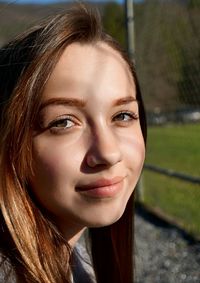 Portrait of smiling young woman