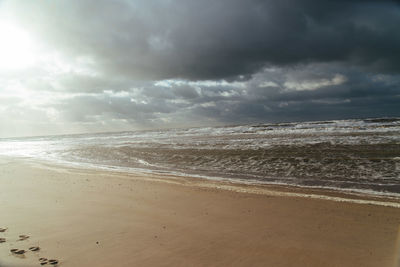 Scenic view of beach against sky