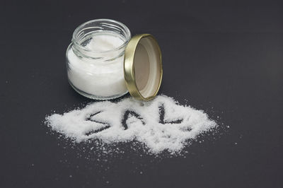 High angle view of ice cream in glass jar on table