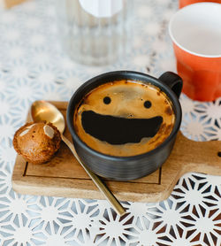 High angle view of coffee cup on table