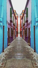 Narrow alley with buildings in background