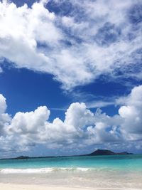 Scenic view of sea against cloudy sky