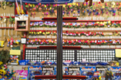 Close-up of rack in shop for sale