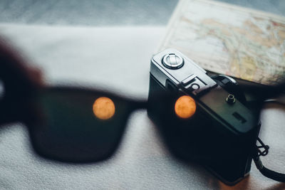 Close-up of camera on table