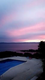 Scenic view of sea against sky at sunset