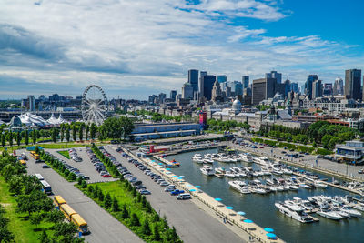 High angle view of city buildings against sky