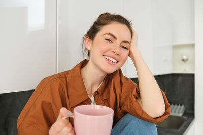 Young woman using mobile phone