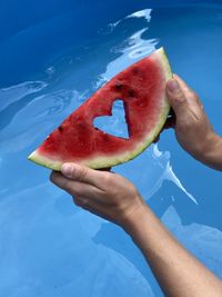 Close-up of hand holding ice cream