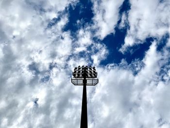 Low angle view of floodlight against sky