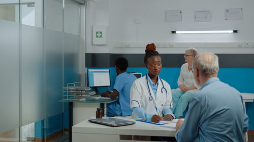 Group of people sitting in a room